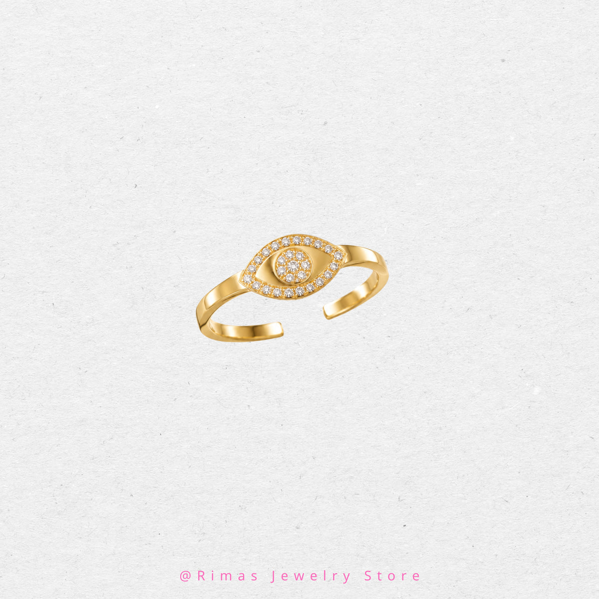 Bague femme dorée Mira avec motif œil et pierres scintillantes